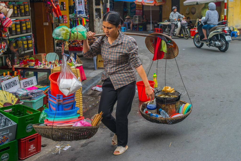 vietnam woman carrying items
