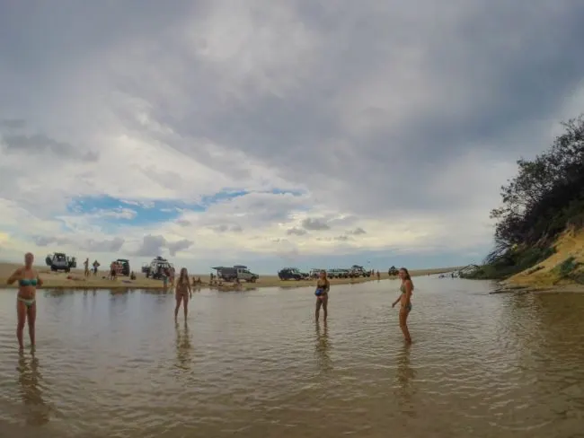 playing in eli creek on fraser island Hervey Bay QLD
