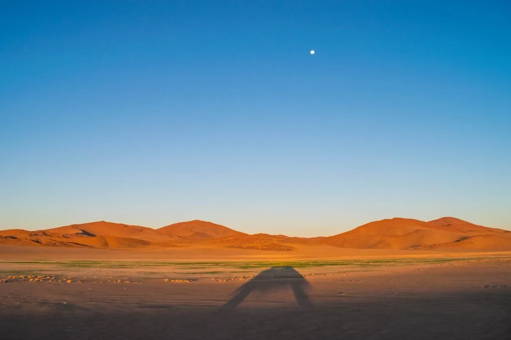 namibian road trip snamib nakluft national park sunrise sand dunes moon