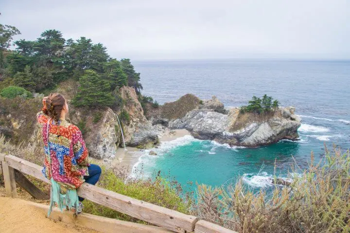 PCH road trip stops on Highway 1 Road Trip california coast big sur cliff views McWay Falls waterfall on the beach kimmie conner travel blogger