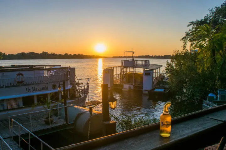 african sunsets - livingstone sunset zambezi river victoria falls