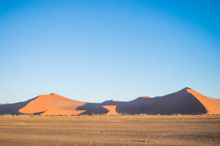 african sunsets over sand dunes in namibia sossusvlei namib desert