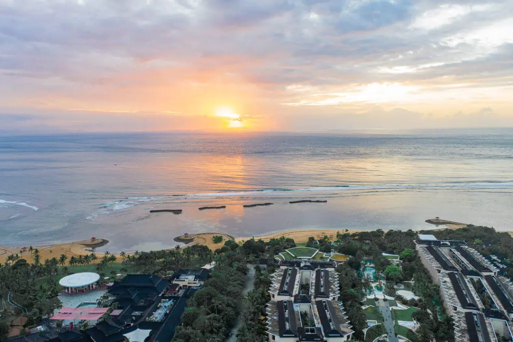 nusa Dua beach hotel and resort drone sunrise over the Sea bali