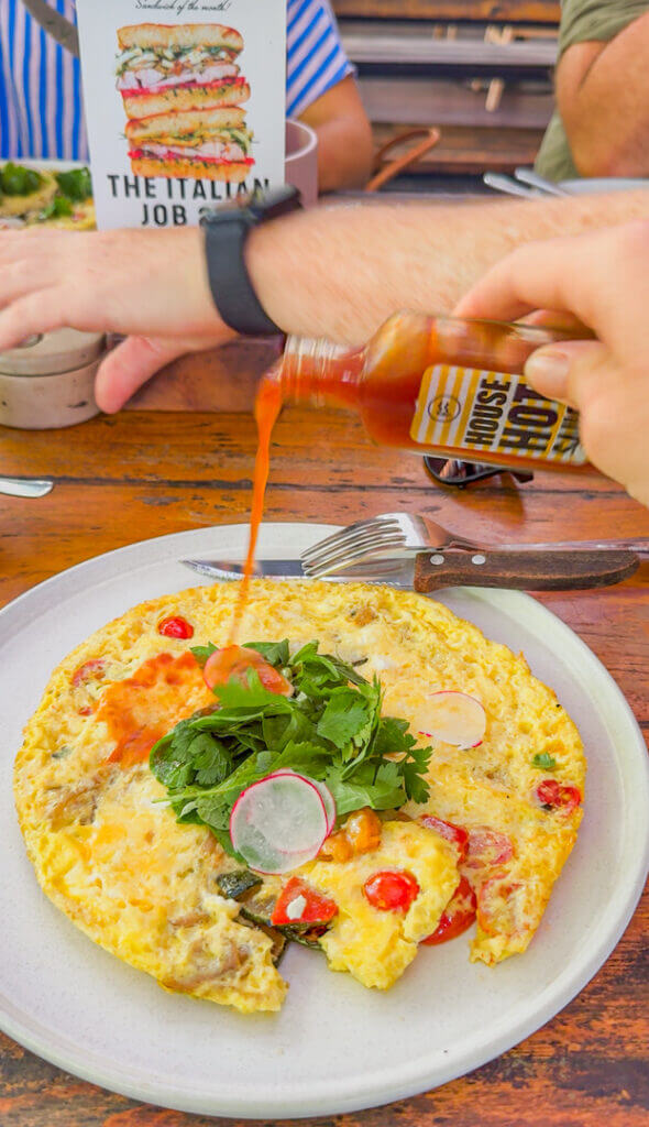 milk and madu omelette and house hot sauce 
