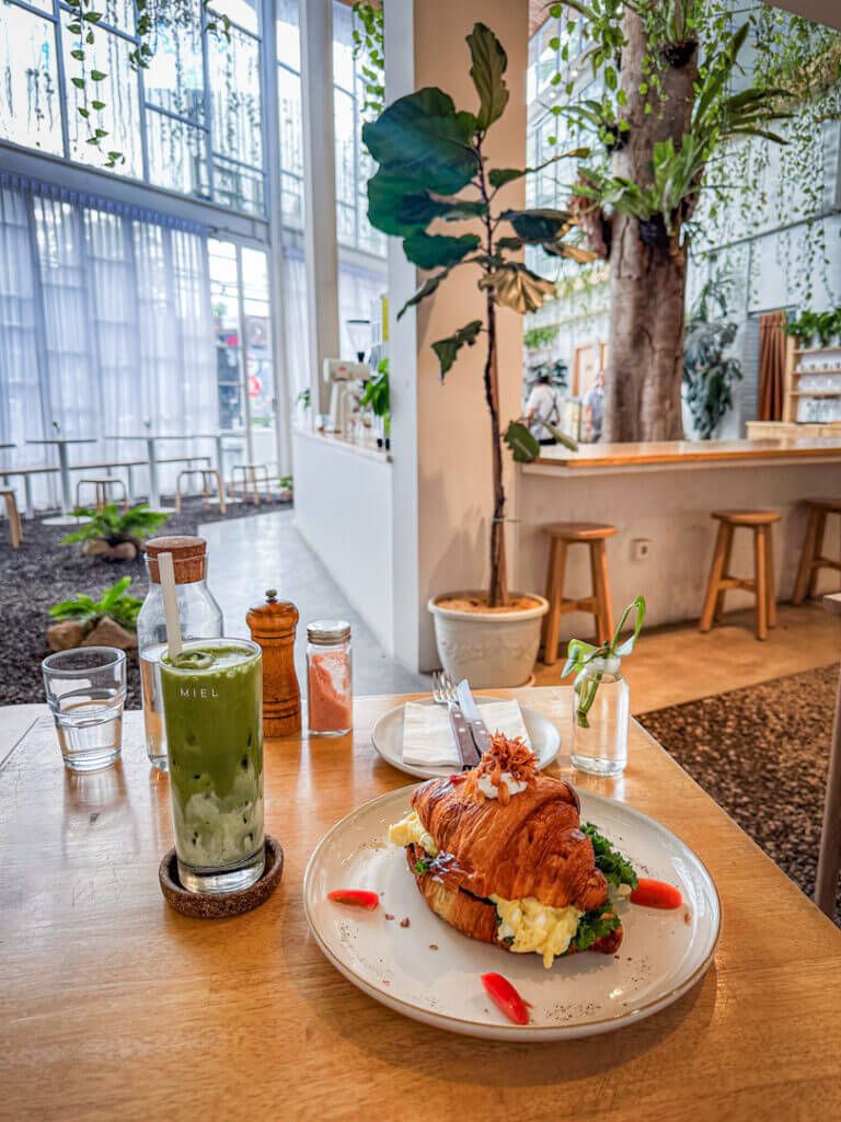 Miel canggu cafe for brunch truffle egg croissant