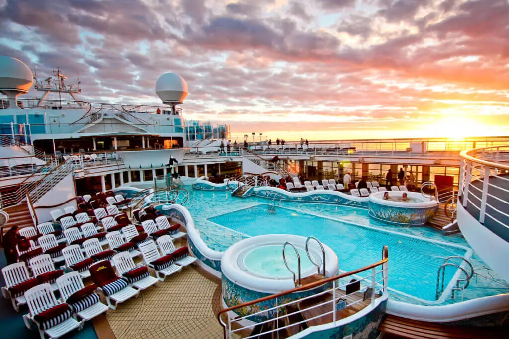 shot of a cruise ship deck with pool, pros of cruise ship travel