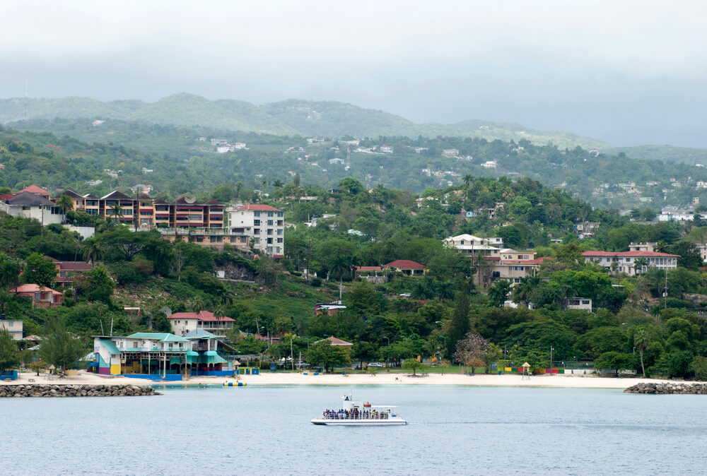 Montego bay beautiful beach and boat trip with view of the mountains 