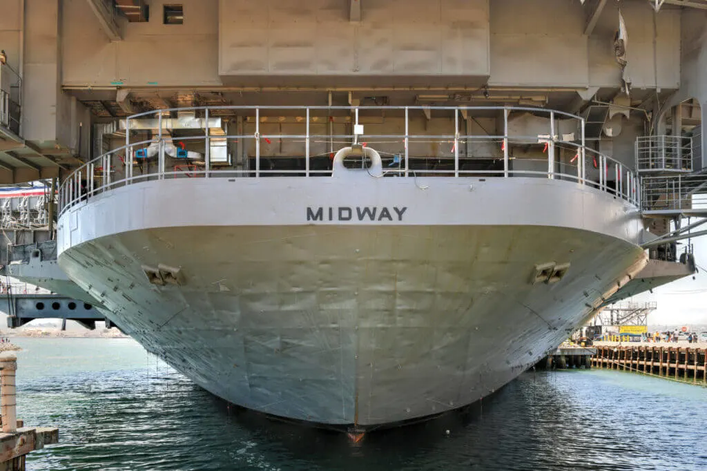 A shot of the USS Midway Ship and Museum with flight simulator san diego couples idea