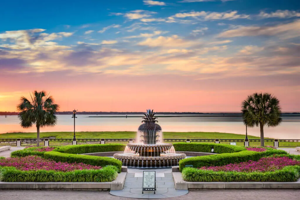 A sunset views of the Pineapple Fountain on the Charleston waterfront offers a romantic thing to do for couples in Charleston 