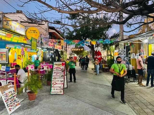 Things to do in downtown cancun - walk down CAlle Tulipanes and choose a restaurant or bar!
