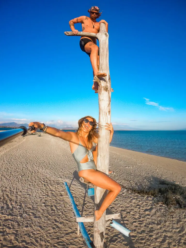 climbing tree on gili putih island bali