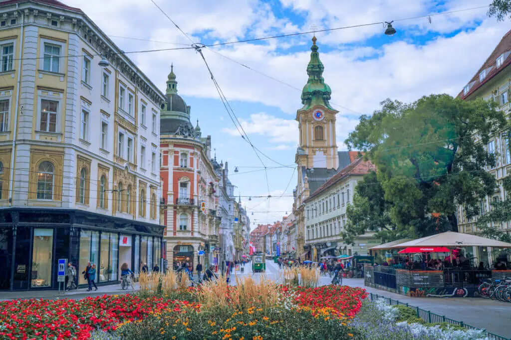 Graz Austria blumgarten with a view of the mains street Herrengasse and graz tram
