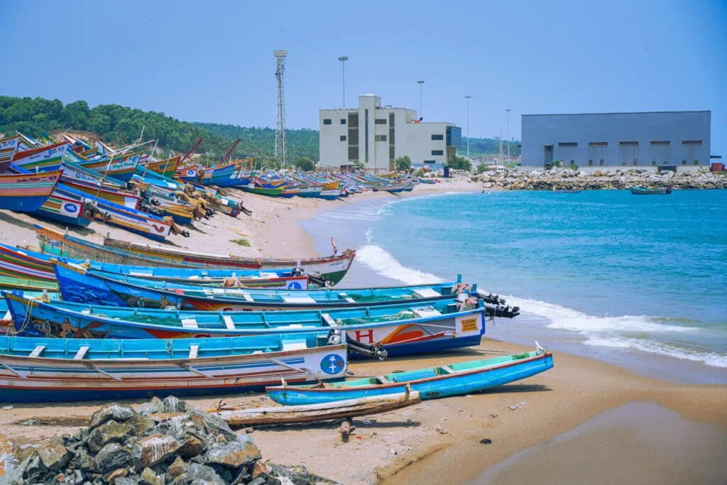 Vizhinjam Beach and fishing boats kovalam tourist places