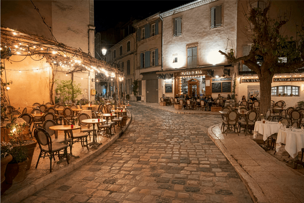 stop on a south of France road trip on Lourmarin for Caf&eacute; Tables, Market Stalls, and a Renaissance Ch&acirc;teau