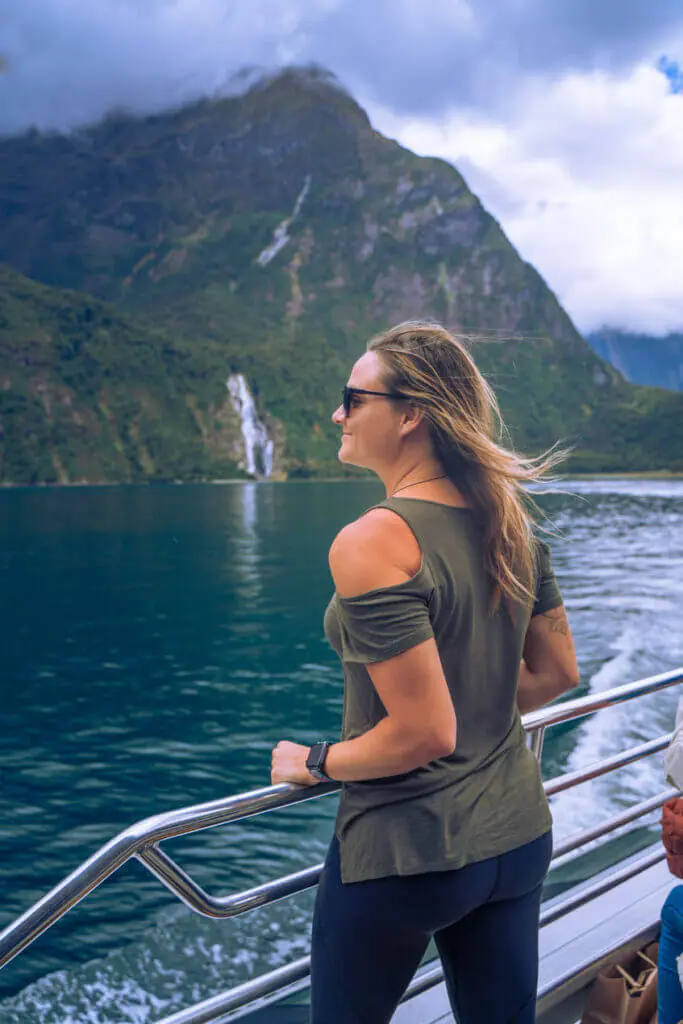 Milford Sound Cruise Bowen Falls view with girl