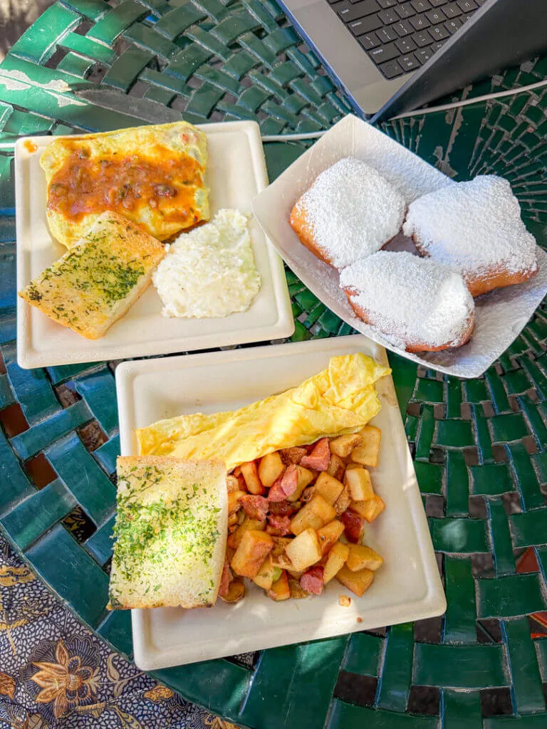 beignets, cajun hash and crawfish omelet at. cafe beignet new orleans 