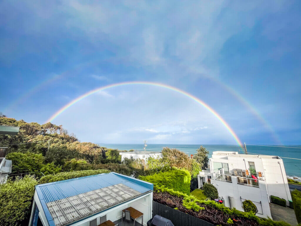 calm after the storm rainbow in australia