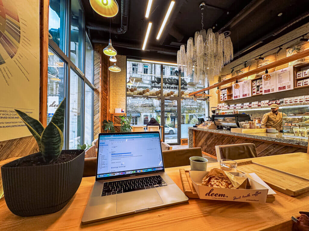 work from cafe while raining traveling
