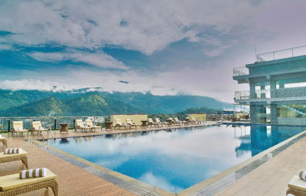 Vibe Munnar Resort rooftop pool and mountains view