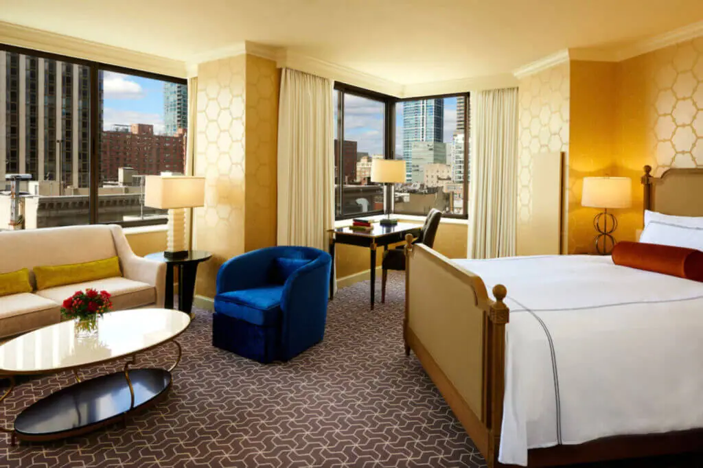 elegent room at The Rittenhouse Hotel in Philadelphia with city views through large windows