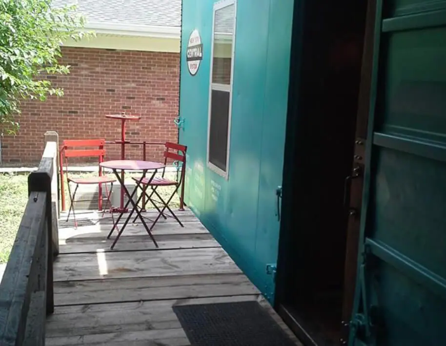 Patio of rail box car accommodation n at Riley's Railhouse