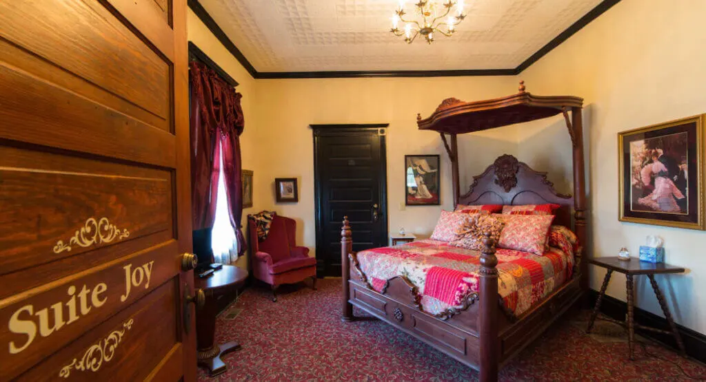 Victorian room interior at Grand Victorian Inn