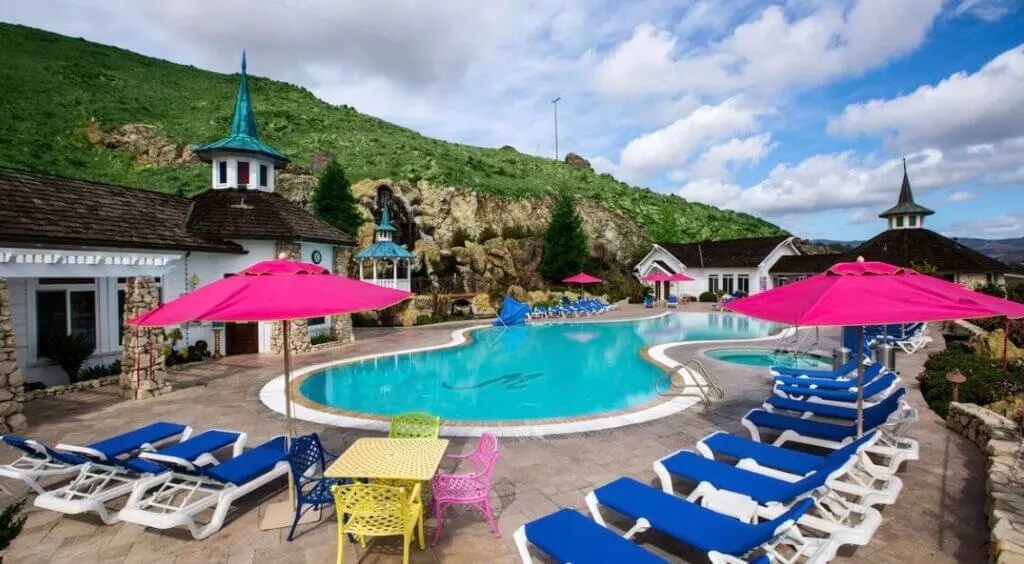 outdoor pool area with views at Hotel Madonna Inn