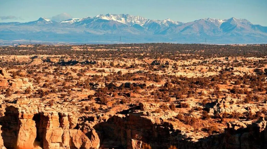 view from Kokopelli’s Cave to the mountains