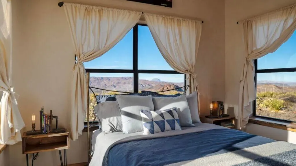corner bedroom with desert views Boca de La Roca Private Mountain Lodge