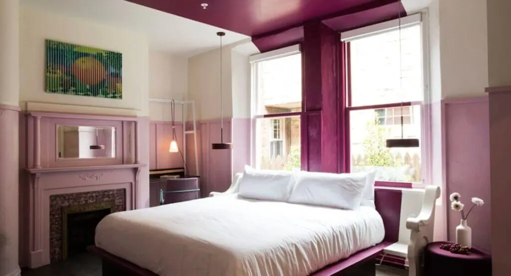 pink room interior at boutique hotel The Russell Hotel US