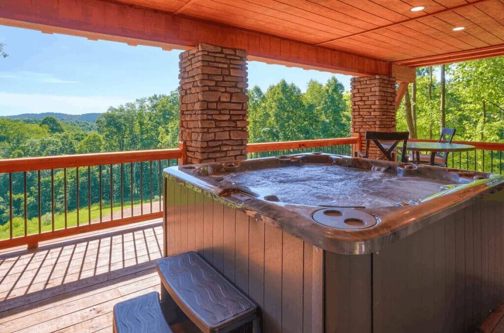 soaring eagle tree house cabin in ohio jacuzzi on the deck view over the forest