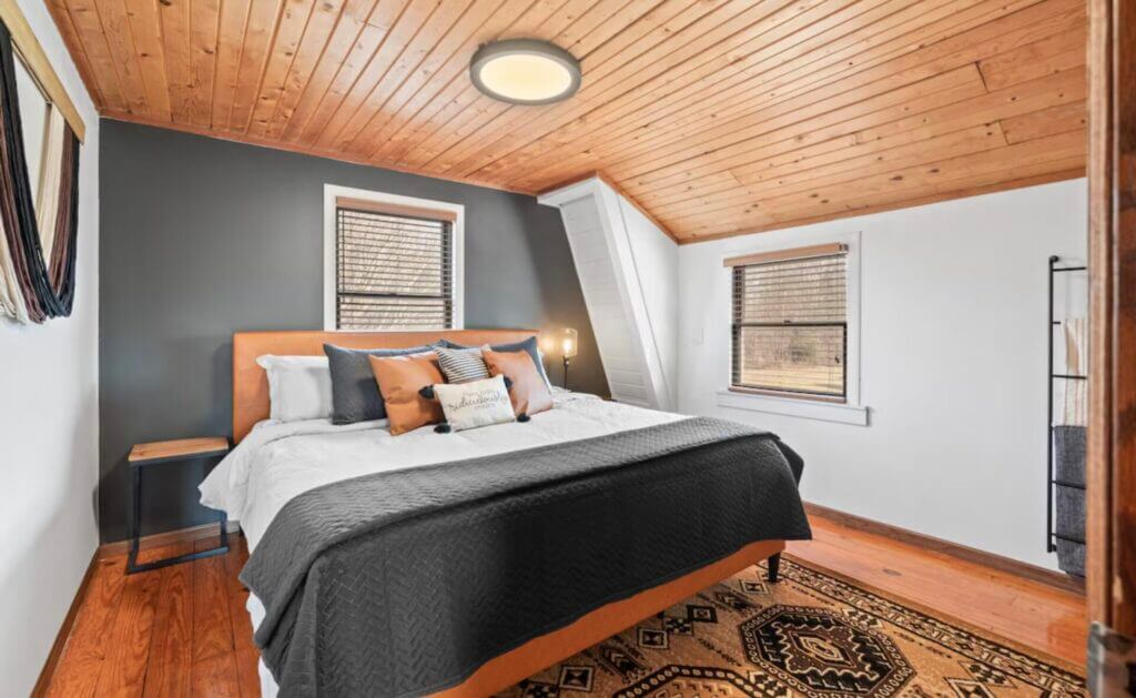 bedroom of 7 Acre Legacy Lodge - Luxe Brown County Cabin