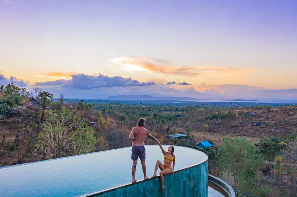 volcano sunset behind main sumberkima hill pool