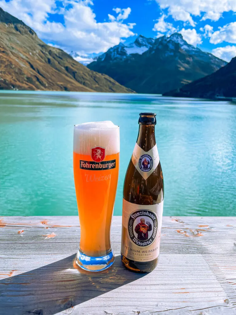 austrian beer over alpine lake 
